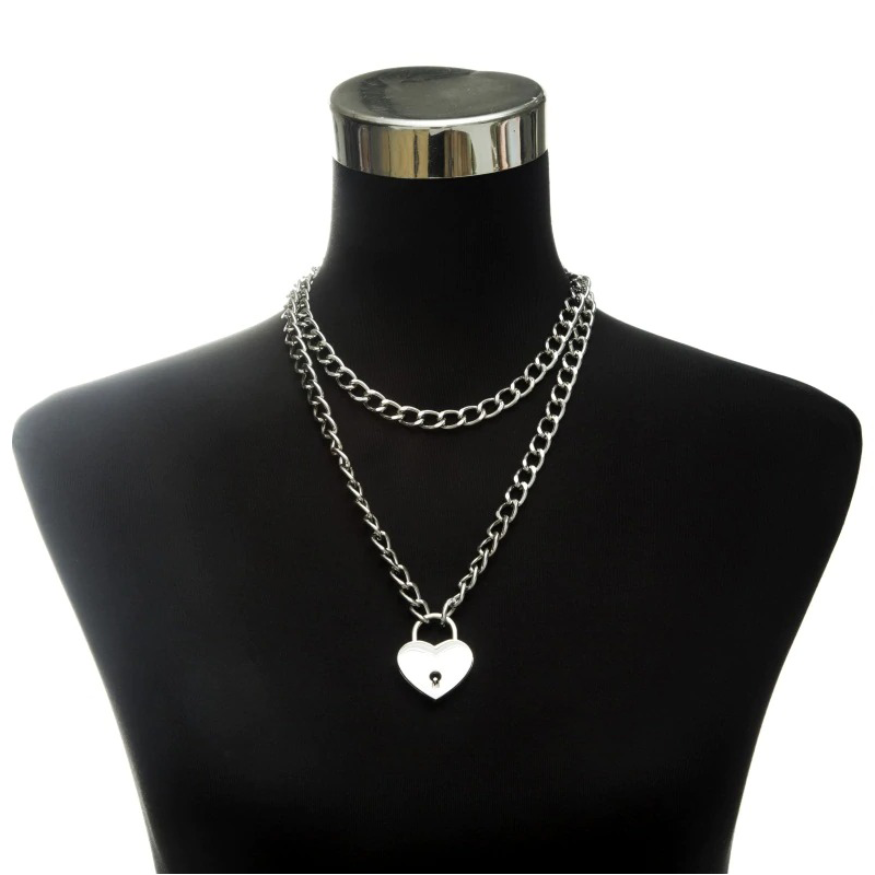 Layered women's chain necklace featuring a heart lock pendant, perfect gothic emo grunge accessory.