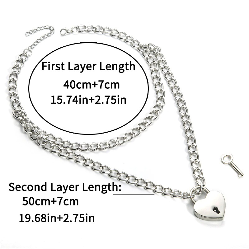 Layered women's chain necklace with heart lock pendant and key, showcasing lengths and design elements.