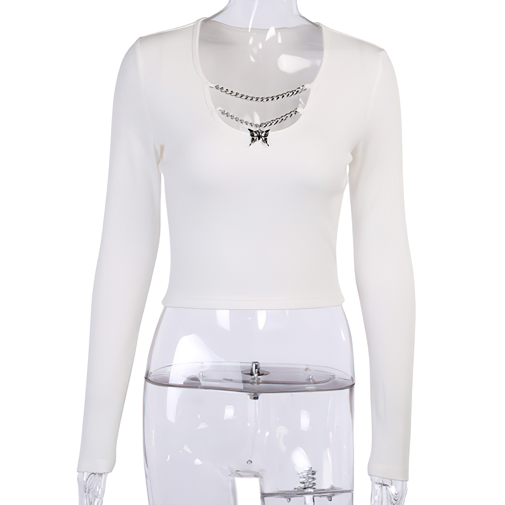 Aesthetic women's crop top in white featuring a silver chain and butterfly pendant, perfect for a gothic-inspired outfit.