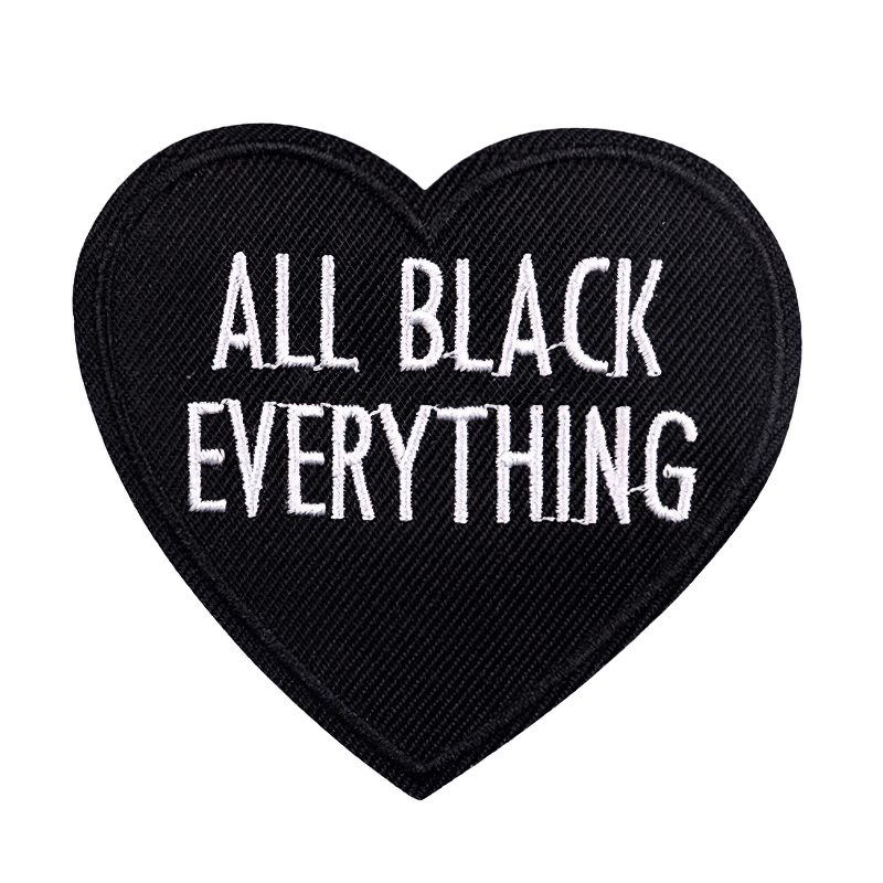 Heart-shaped patch with 'All Black Everything' inscription in stylish black design.