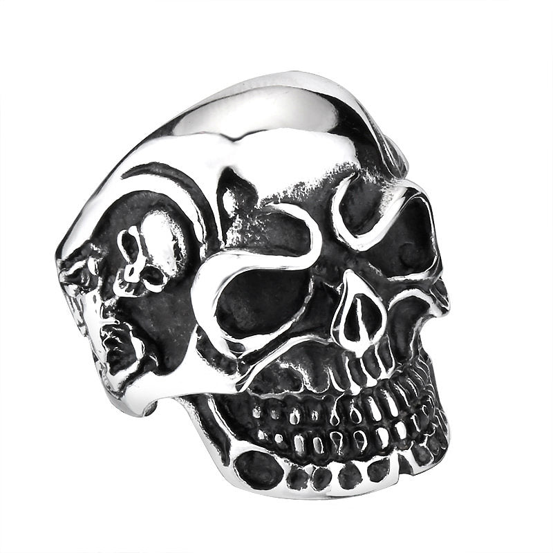 Big triple skull ring in stainless steel, showcasing unique rock style biker jewelry design.