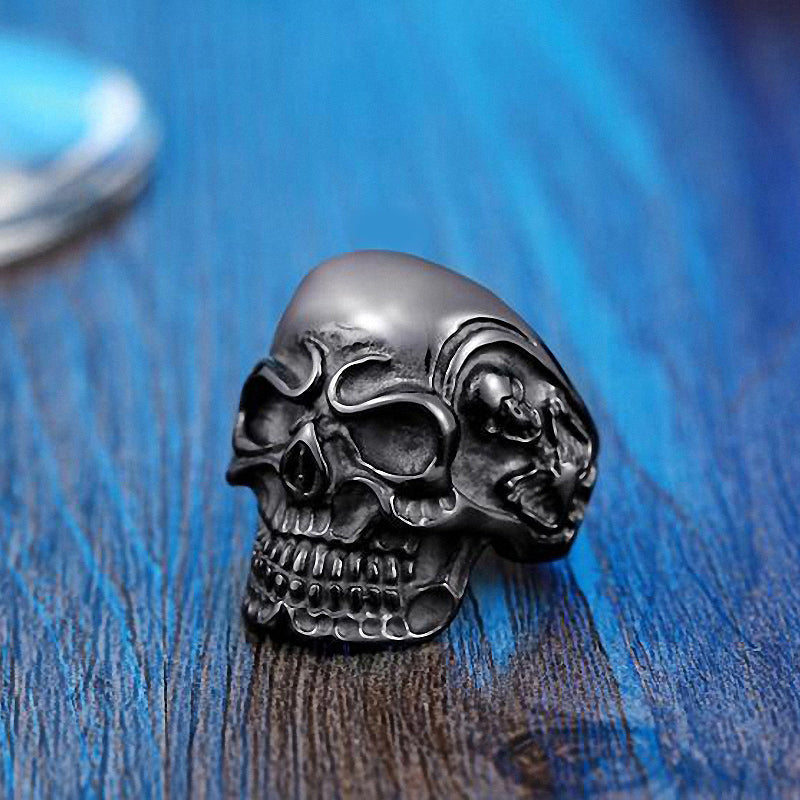 Big Triple Skull Ring in stainless steel, showcasing a detailed skull design, perfect for rock style accessories.