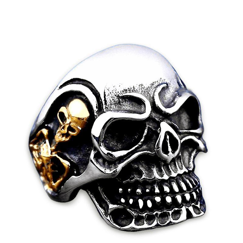 Big Triple Skull Ring in stainless steel with gold accents - edgy rock style biker jewelry.