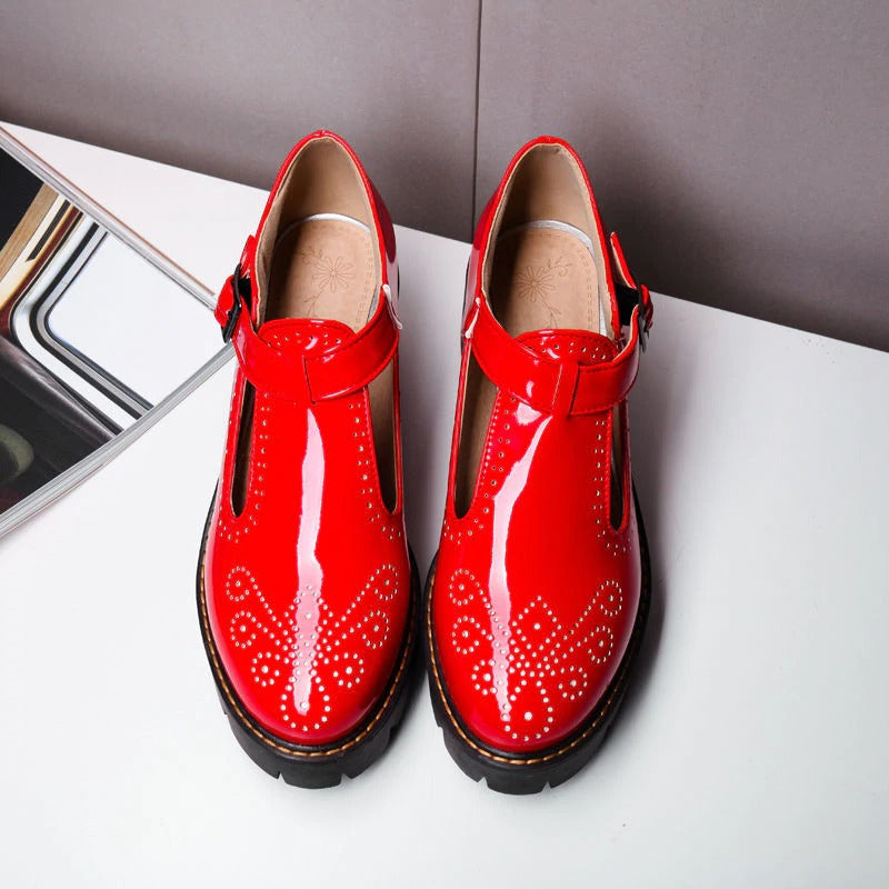 Alternative fashion red brogue round toe flats with buckle strap for women.