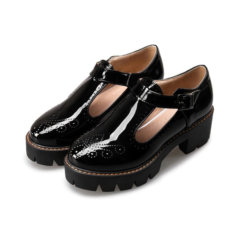 Alternative fashion black brogue round toe flats with buckle strap for women, perfect for creating stylish looks.
