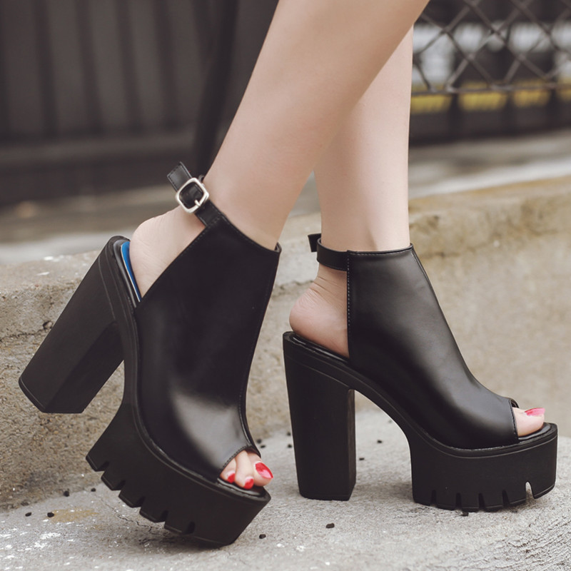 Black high heel sandals with chunky platform and open toe, perfect for alternative fashion lovers.