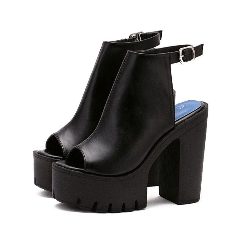 Stylish black high heel sandals with open toe and ankle strap for women, perfect for alternative fashion looks.