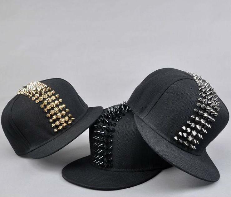 Three punk rock baseball caps with spike studs in gold and silver, perfect for alternative fashion enthusiasts.