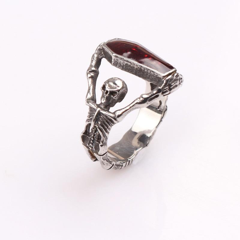 Unisex alternative gothic skeleton ring featuring a red rhinestone, perfect for rock concerts and festivals.