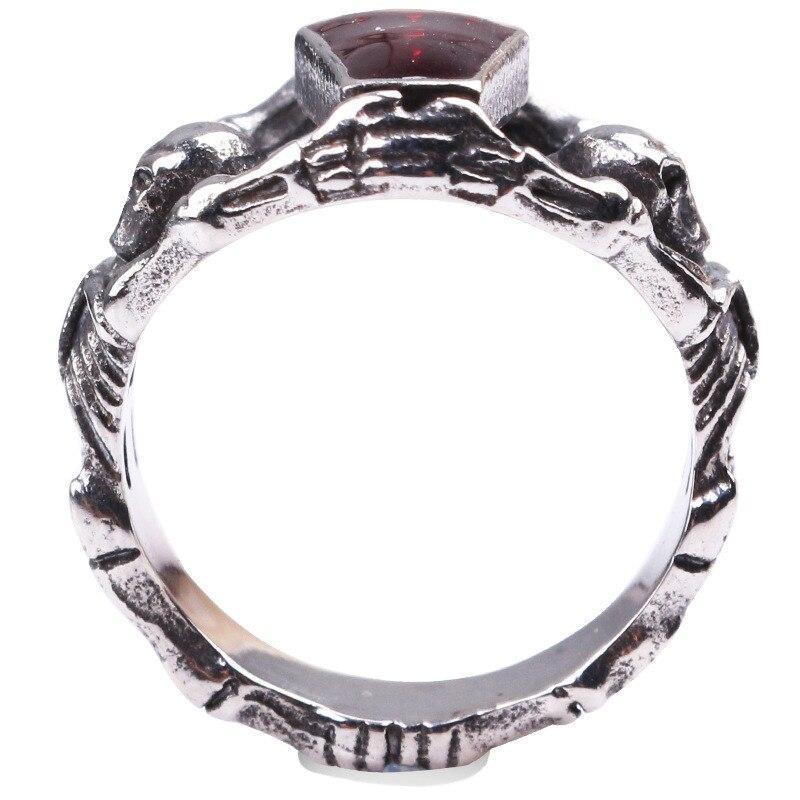 Alternative gothic skeleton ring with red rhinestone, crafted in zinc alloy, perfect for unisex rock jewelry.