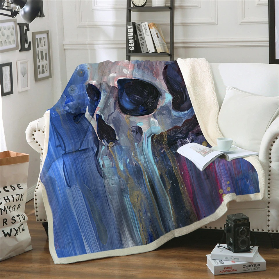 Gothic plush blanket featuring artistic skull design, perfect for cozy home decor and unique gift ideas.
