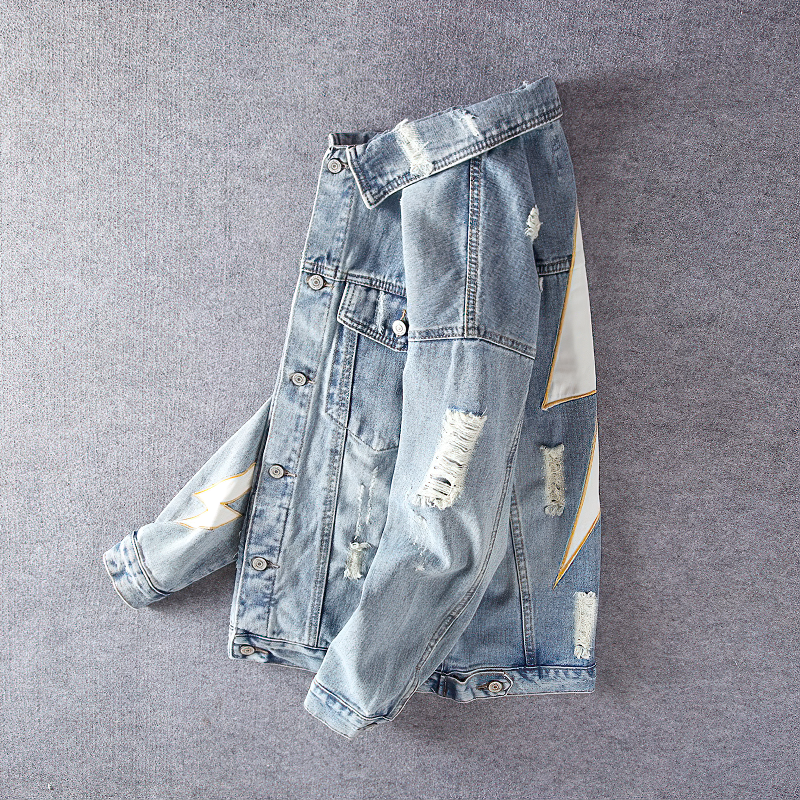 Stylish alternative men's denim jacket with white lightning print, ideal for spring and autumn fashion.