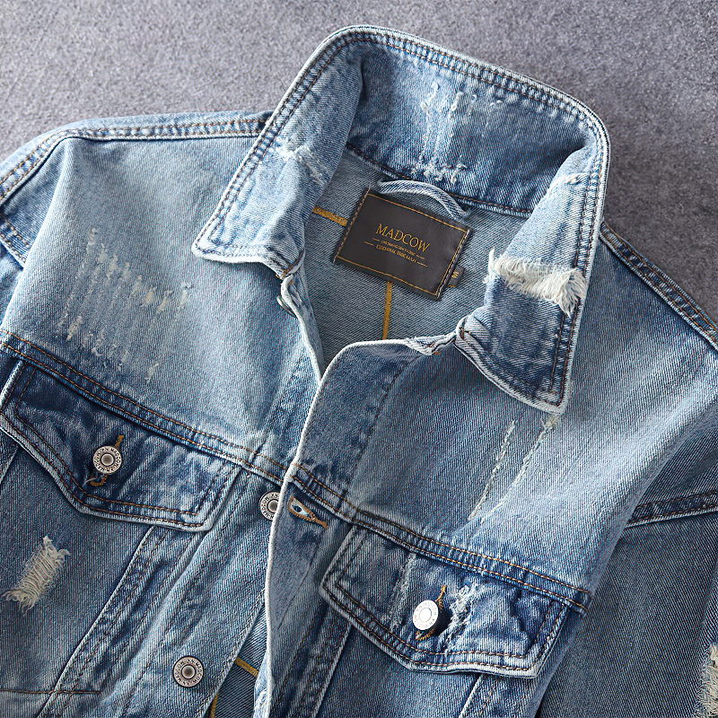 Stylish alternative men's denim jacket with pockets and distressed details, perfect for spring and autumn fashion.