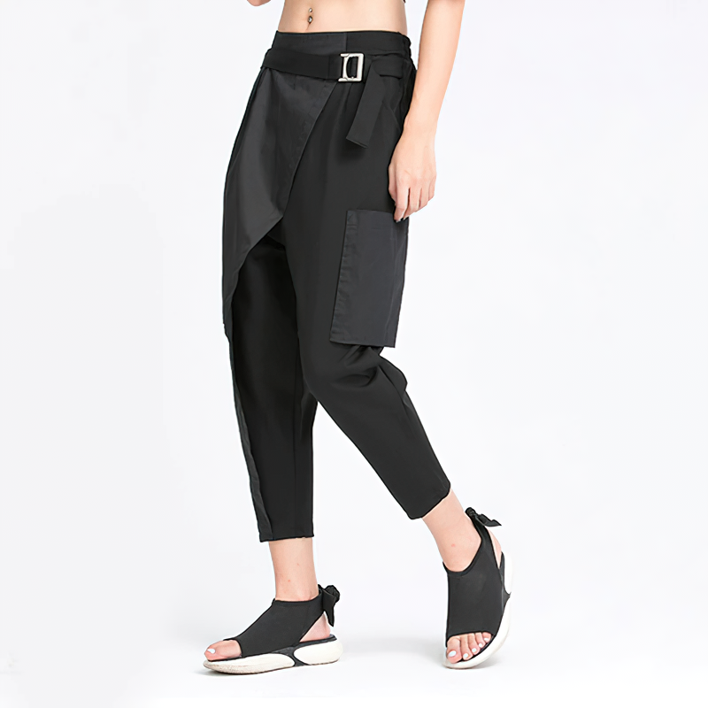 Trendy women's high elastic waist black trousers, featuring a stylish belt, side pockets, and loose fit for an alternative fashion look.