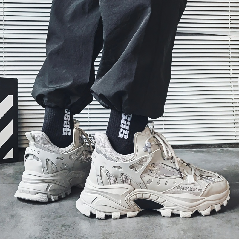 Men's alternative style high sole PU leather sneakers in light gray, paired with black fashion socks.