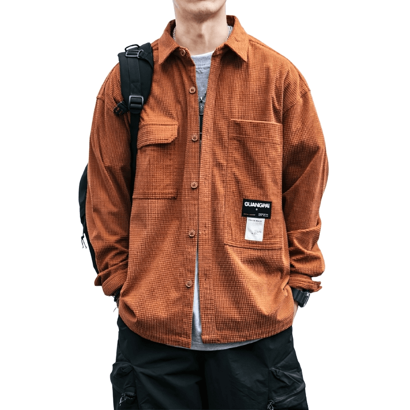 Men's loose waffle plaid shirt in orange with pockets, perfect for alternative style clothing.