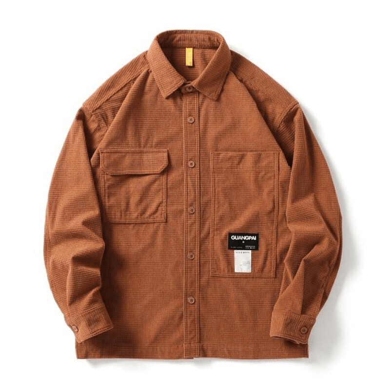 Loose men's waffle plaid shirt in earthy brown color with pockets for stylish alternative style.