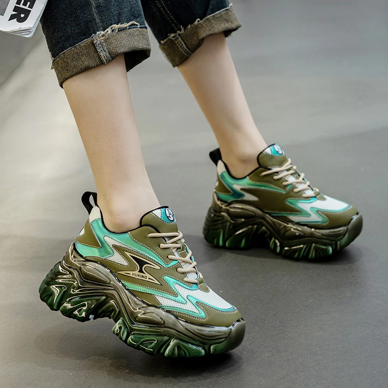 Trendy women's multicolored platform sneakers with stylish green and blue design.