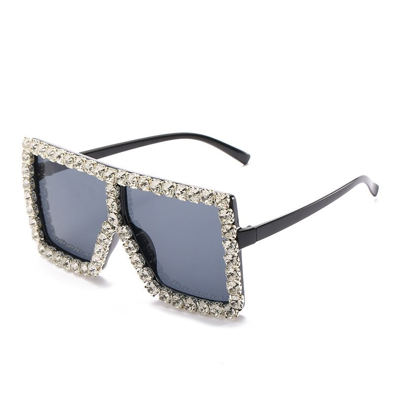 Stylish women's sunglasses with rhinestones, perfect for alternative fashion and vintage vibes.