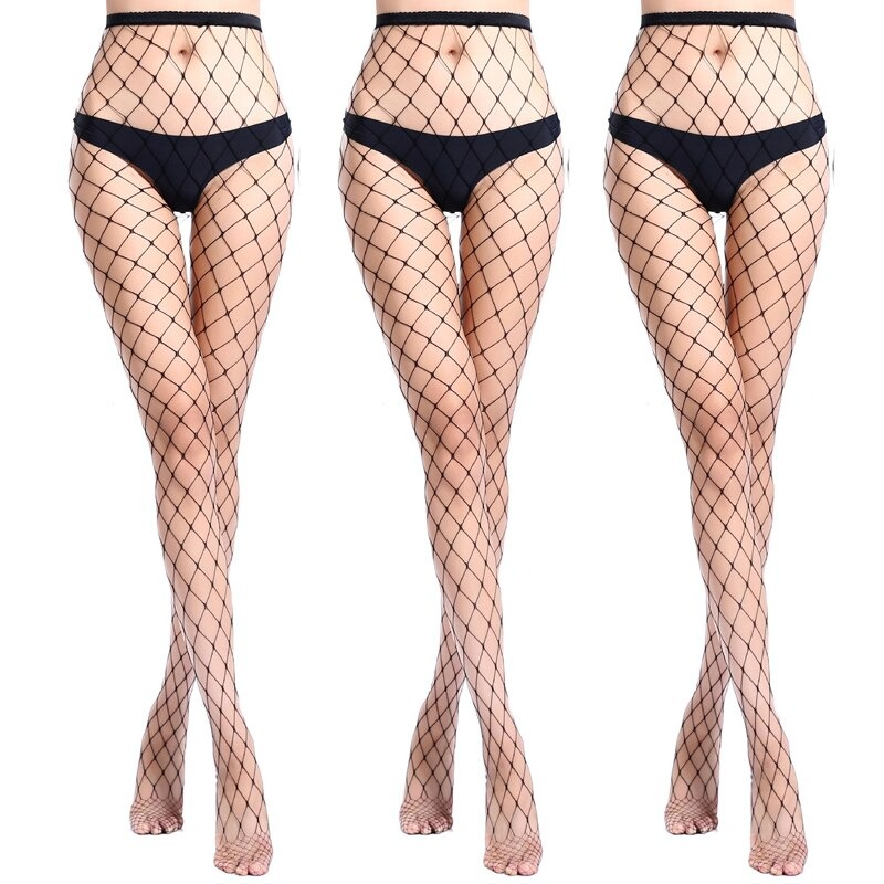 Three pairs of legs in black fishnet pantyhose, perfect for edgy summer fashion and alternative styles.