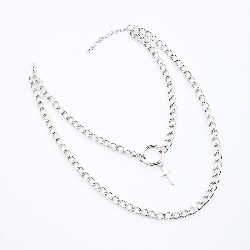 Alternative layered chain necklace with cross pendant, perfect for punk and grunge styles.