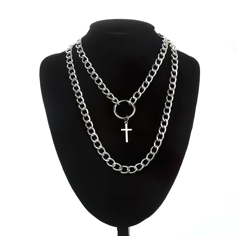 Layered punk necklace with lock and cross pendant, perfect for alternative female style.