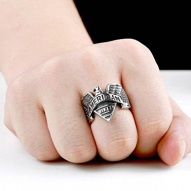 Stainless steel American Biker Eagle ring showcased on a hand, perfect for rock fashion enthusiasts.