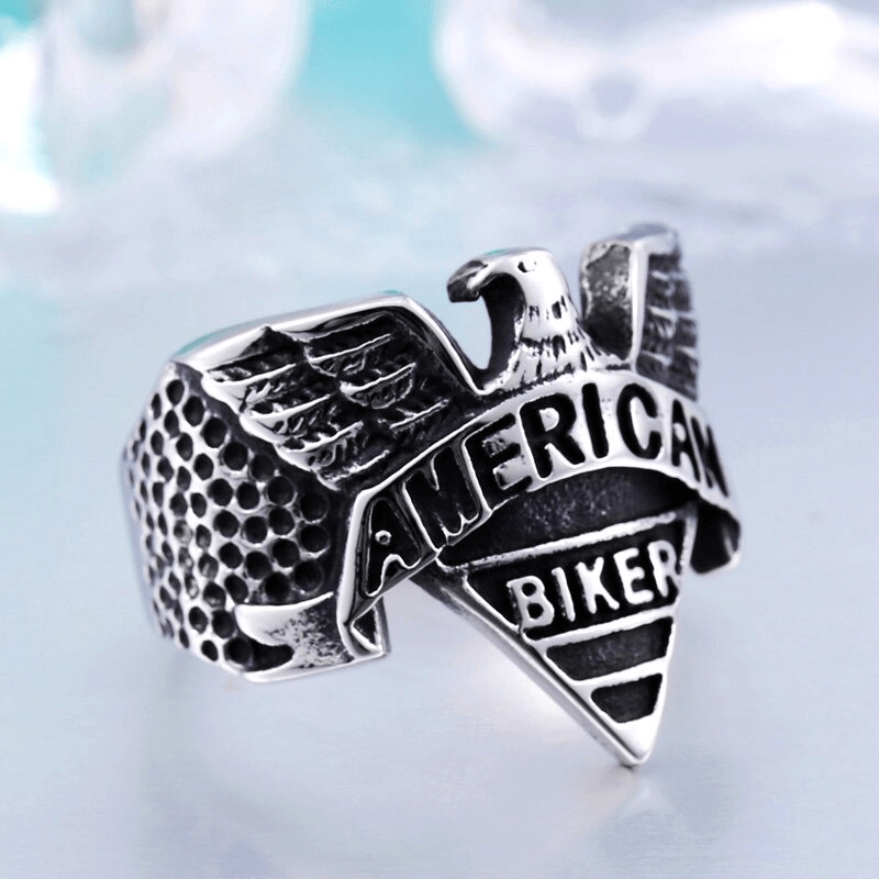 American Biker Eagle Ring in stainless steel, showcasing a bold eagle design with the words 'American Biker'.