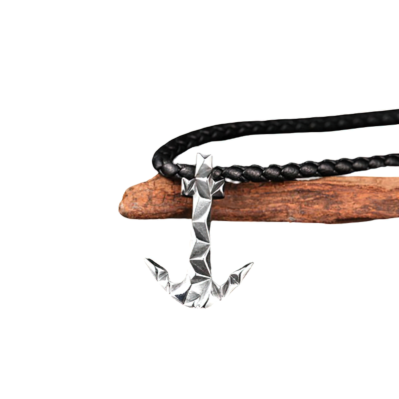 Stylish unisex anchor-shaped stainless steel pendant on a braided black cord necklace.