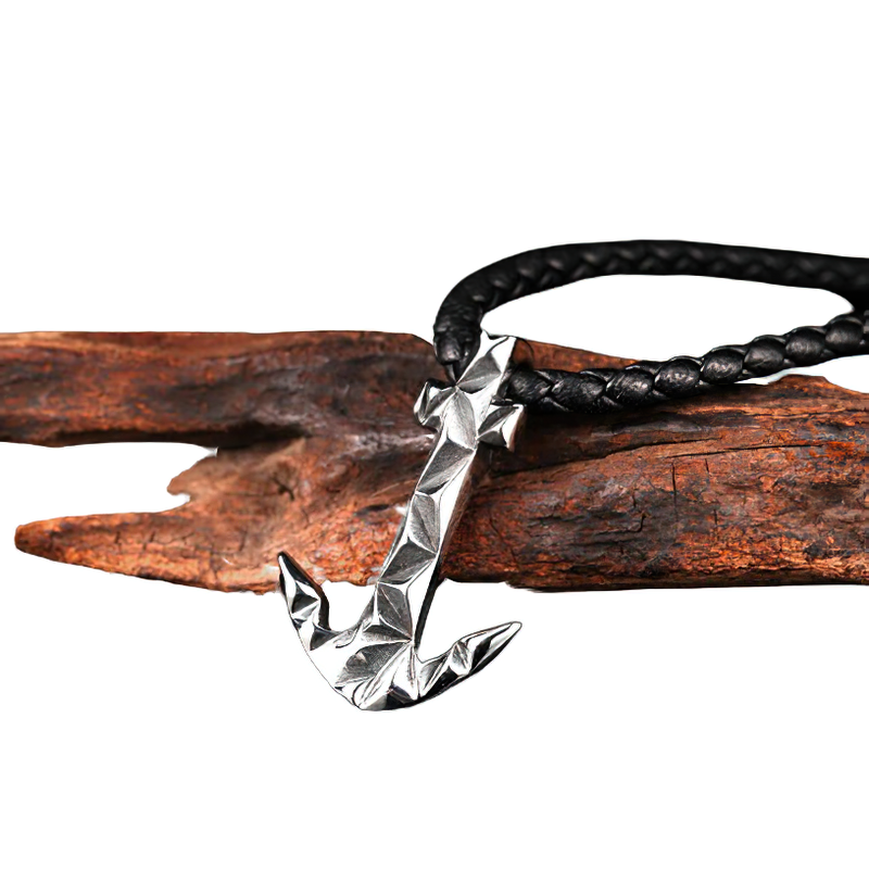 Stylish unisex anchor-shaped stainless steel pendant on braided black cord, perfect gothic accessory.