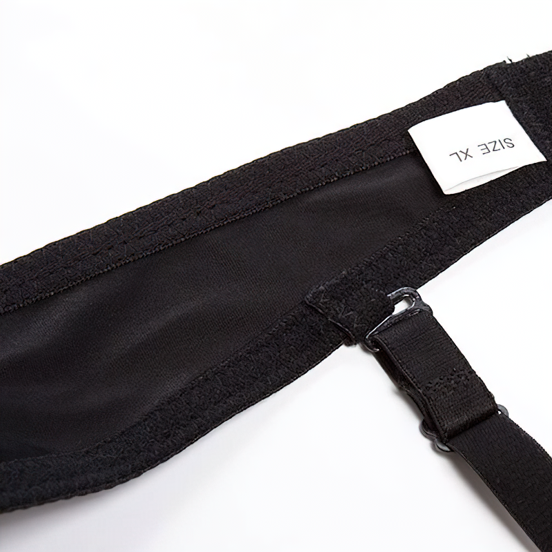Close-up view of a black bra strap with adjustable buckle, featuring a size label reading 'XL' in a stylish font.