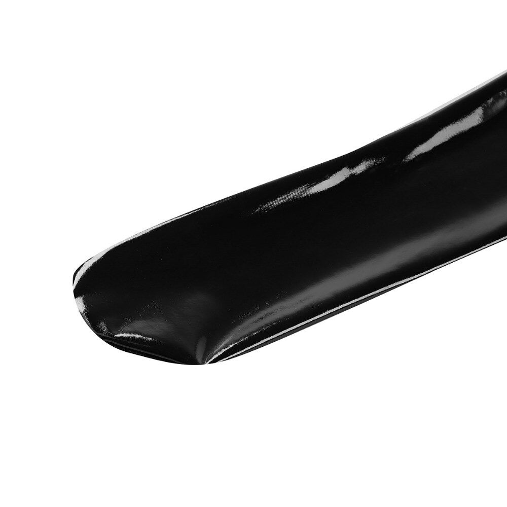 Close-up of black anti-skid wetlook patent leather stocking, perfect for goth or cosplay fashion.