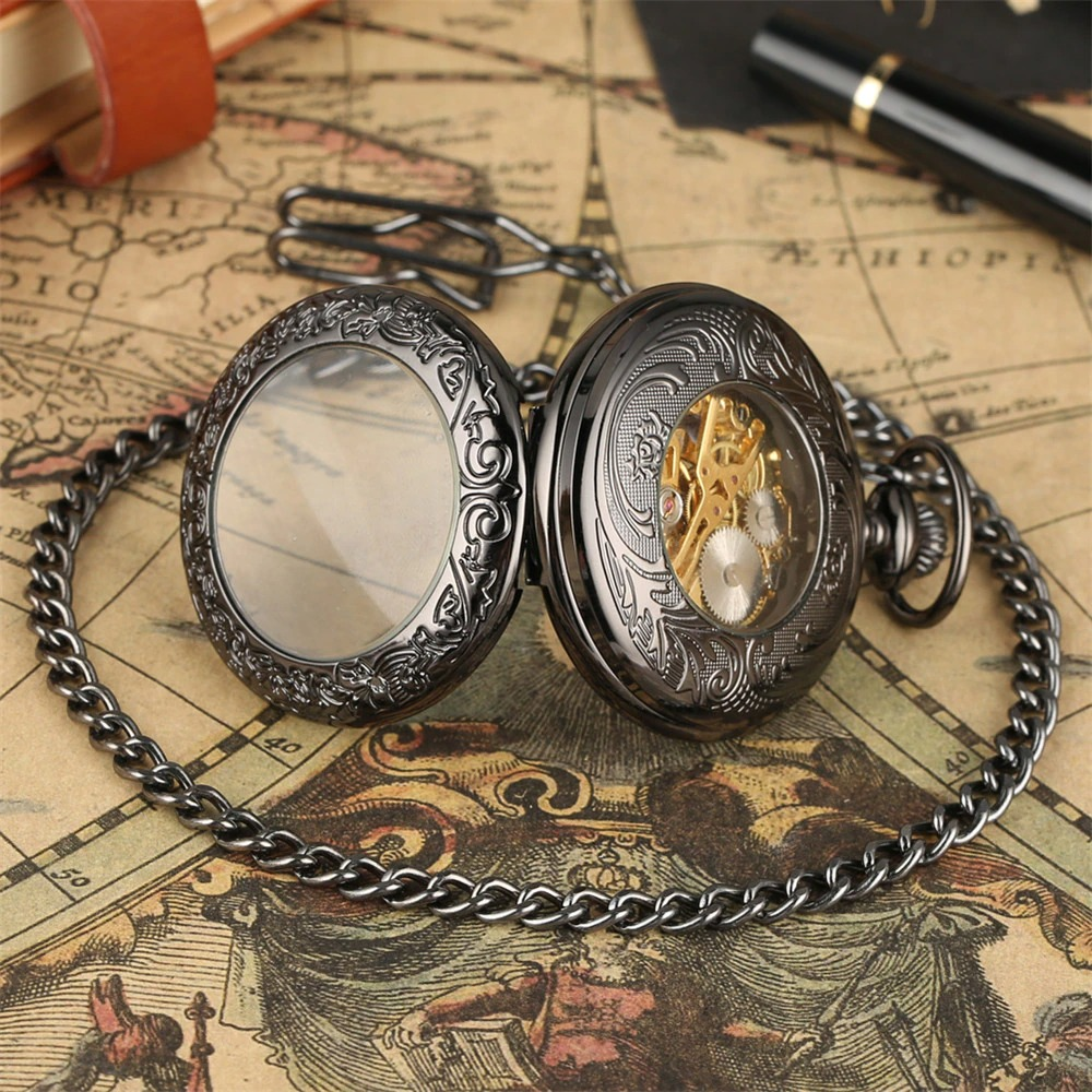 Antique black mechanical pocket watch with silver fittings and Roman numerals, perfect gift for watch lovers.