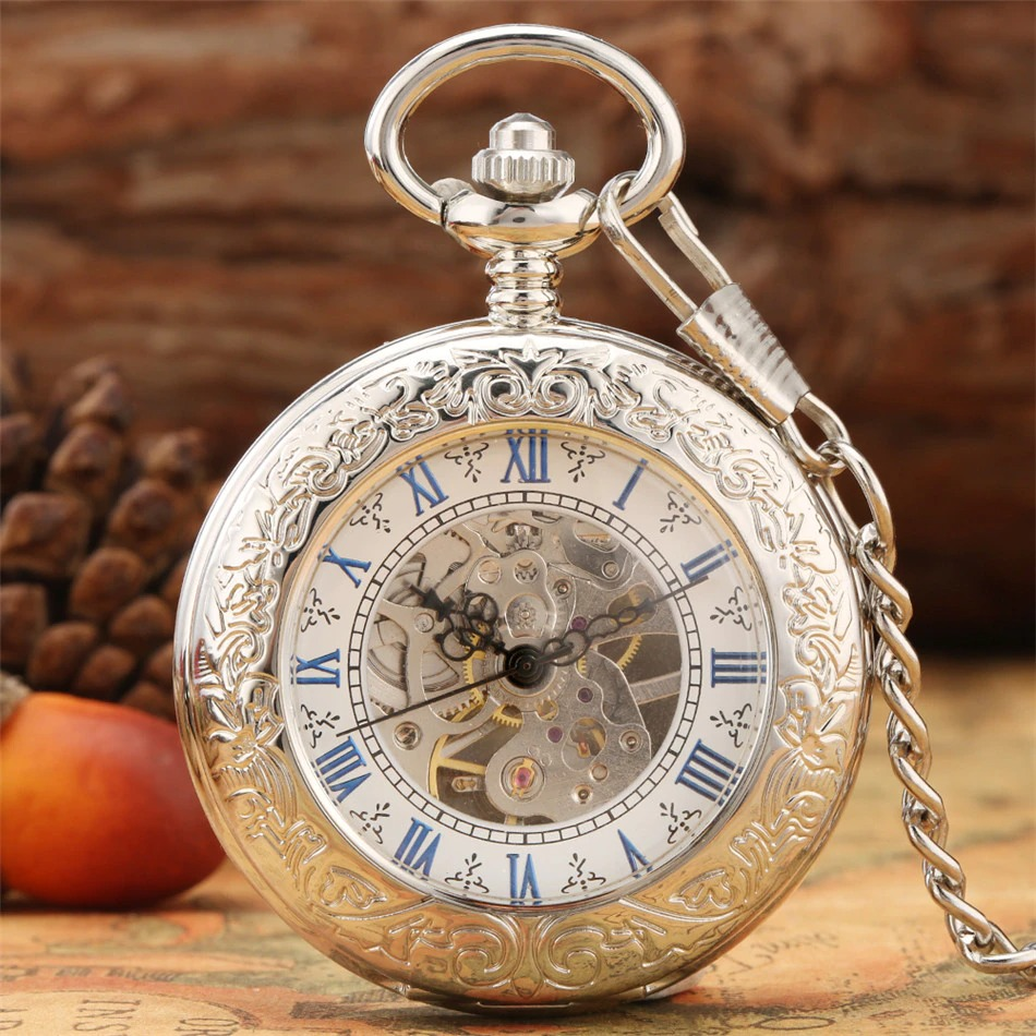Antique mechanical pocket watch with blue Roman numerals and silver fittings, perfect accessory for men and women.