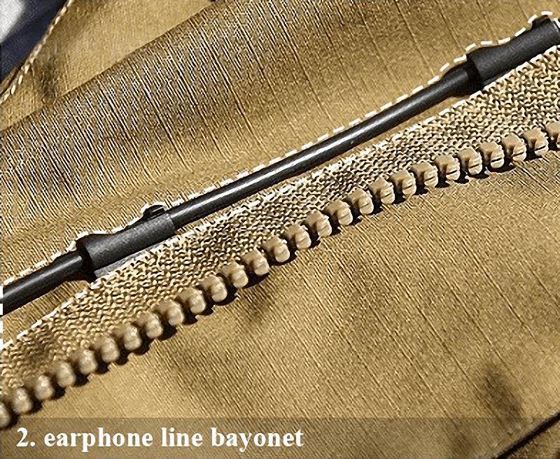 Close-up of the earphone line bayonet on a tactical jacket zipper for enhanced utility and convenience.
