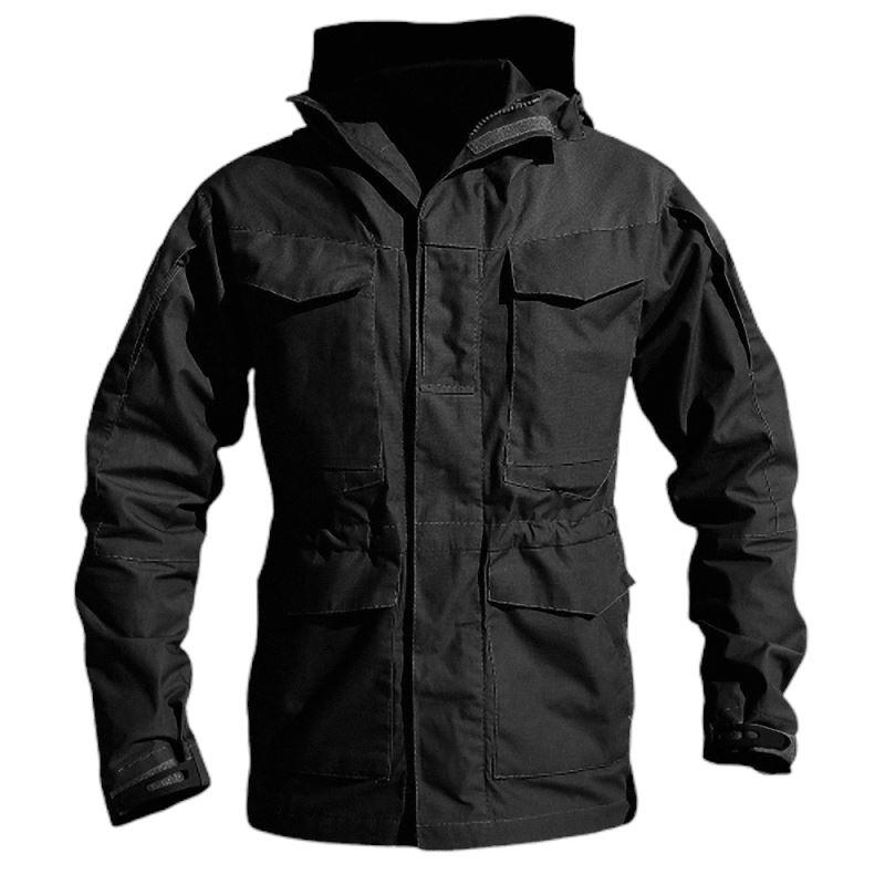 Men's black tactical military jacket with hood, zippers, and multiple pockets for outdoor activities.