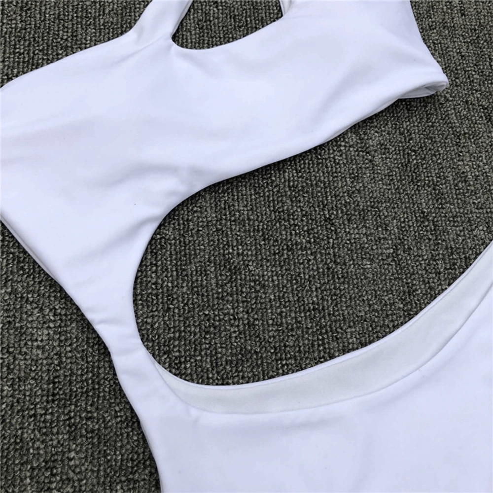 Asymmetrical white one piece swimsuit for women, showcasing stylish cut and design details.