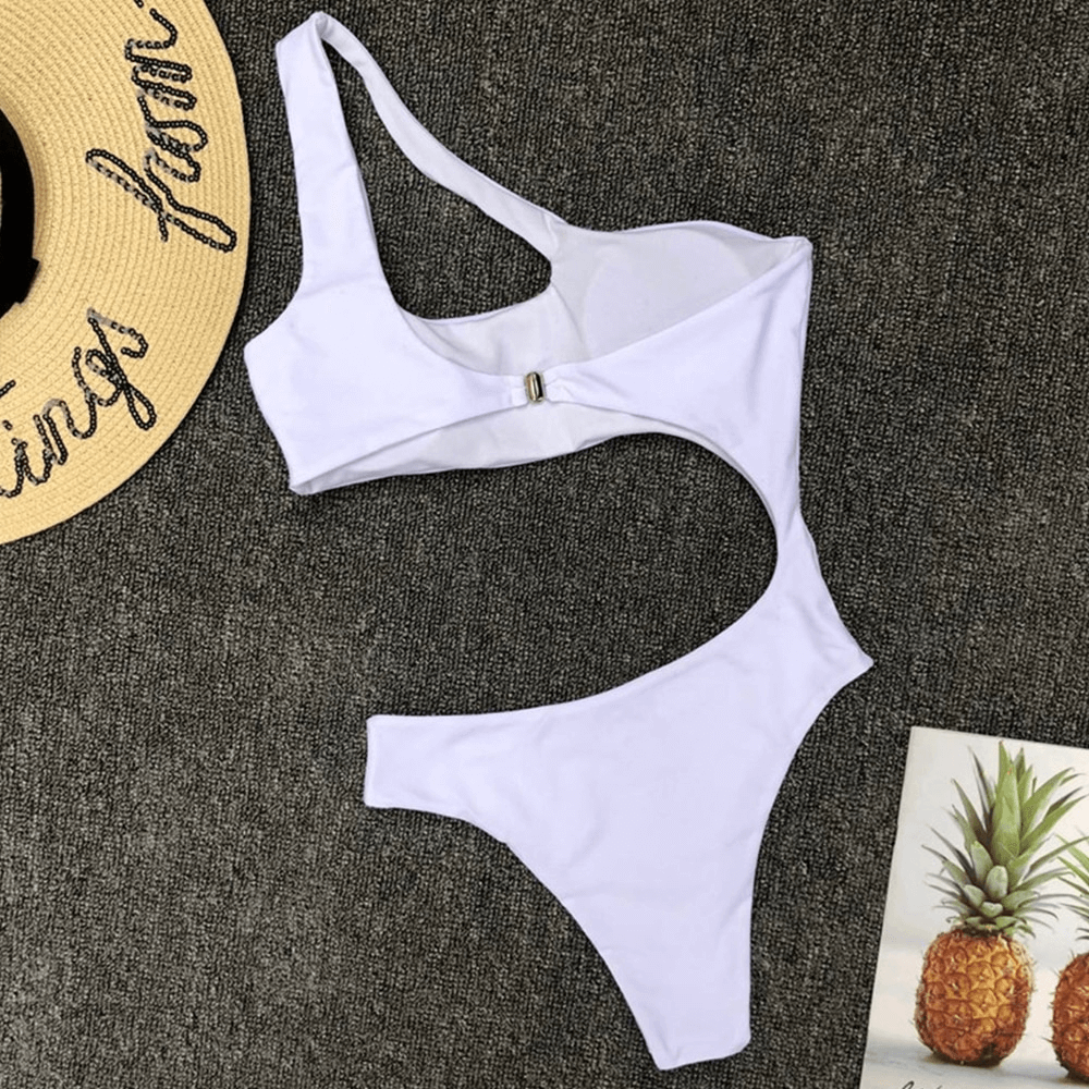 Stylish women's asymmetrical one-piece swimsuit in white, perfect for a trendy beach look.