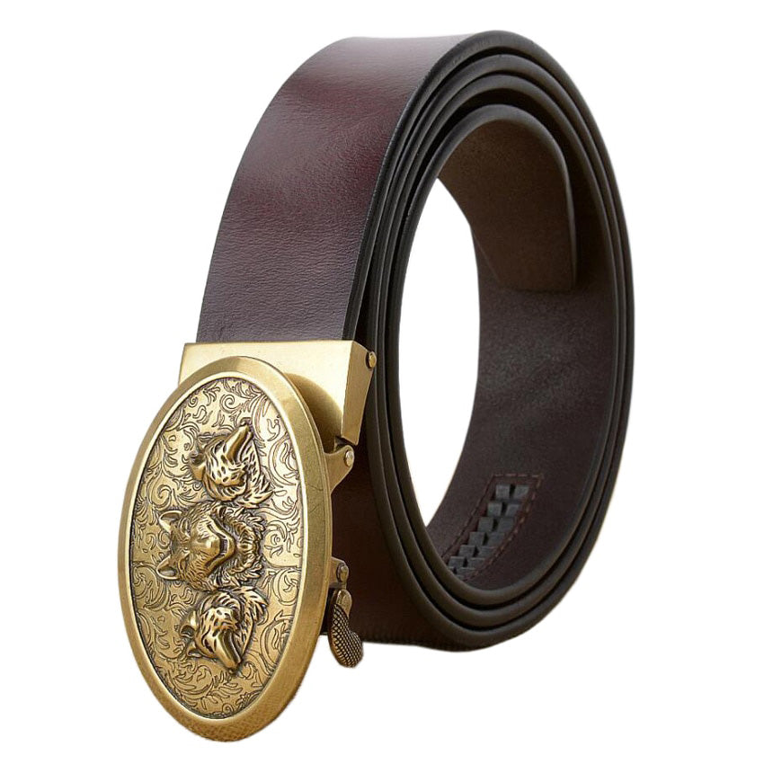 Automatic buckle cowhide leather belt with ornate animal print buckle for men and women, stylish and comfortable.