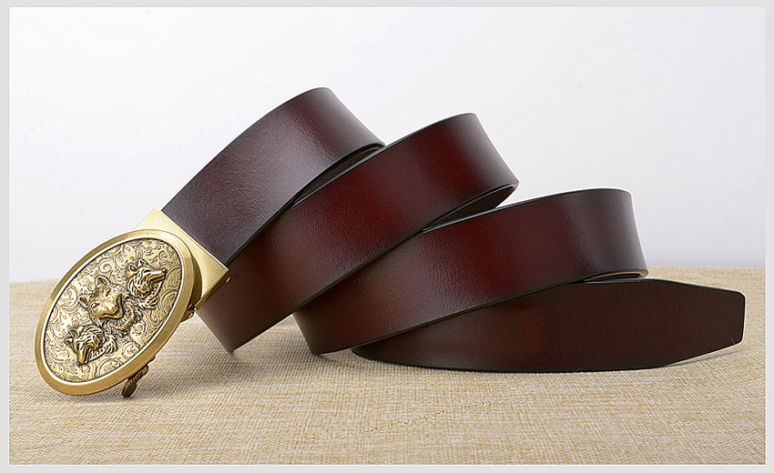 Luxury cowhide leather belt with ornate gold automatic buckle, stylish and comfortable for men and women.