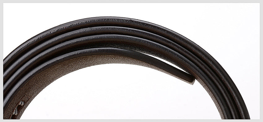 Close-up of a rolled Automatic Buckle cowhide leather belt, showcasing its smooth texture and dark color.