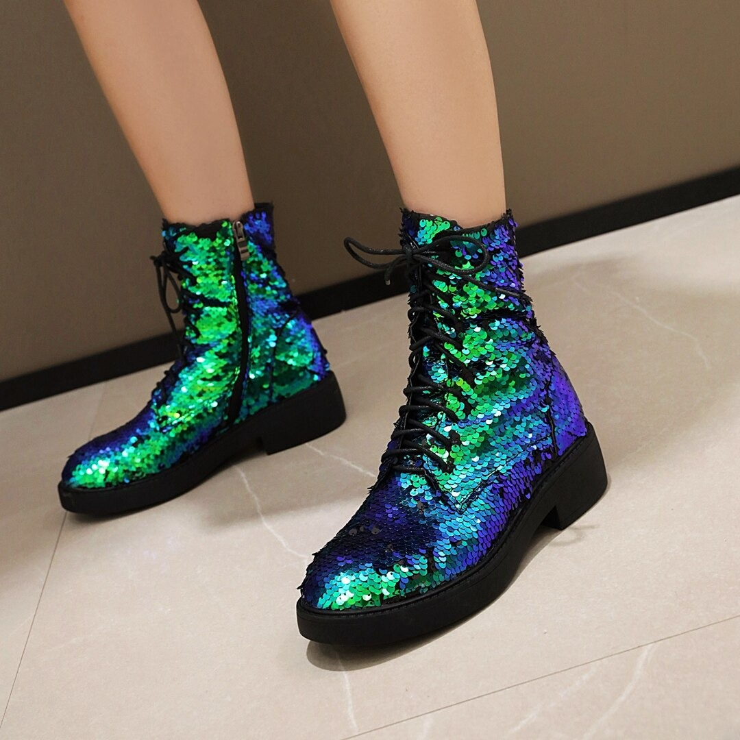 Colorful women's sequins ankle boots in blue and green, featuring stylish lace-up design and a chunky sole.