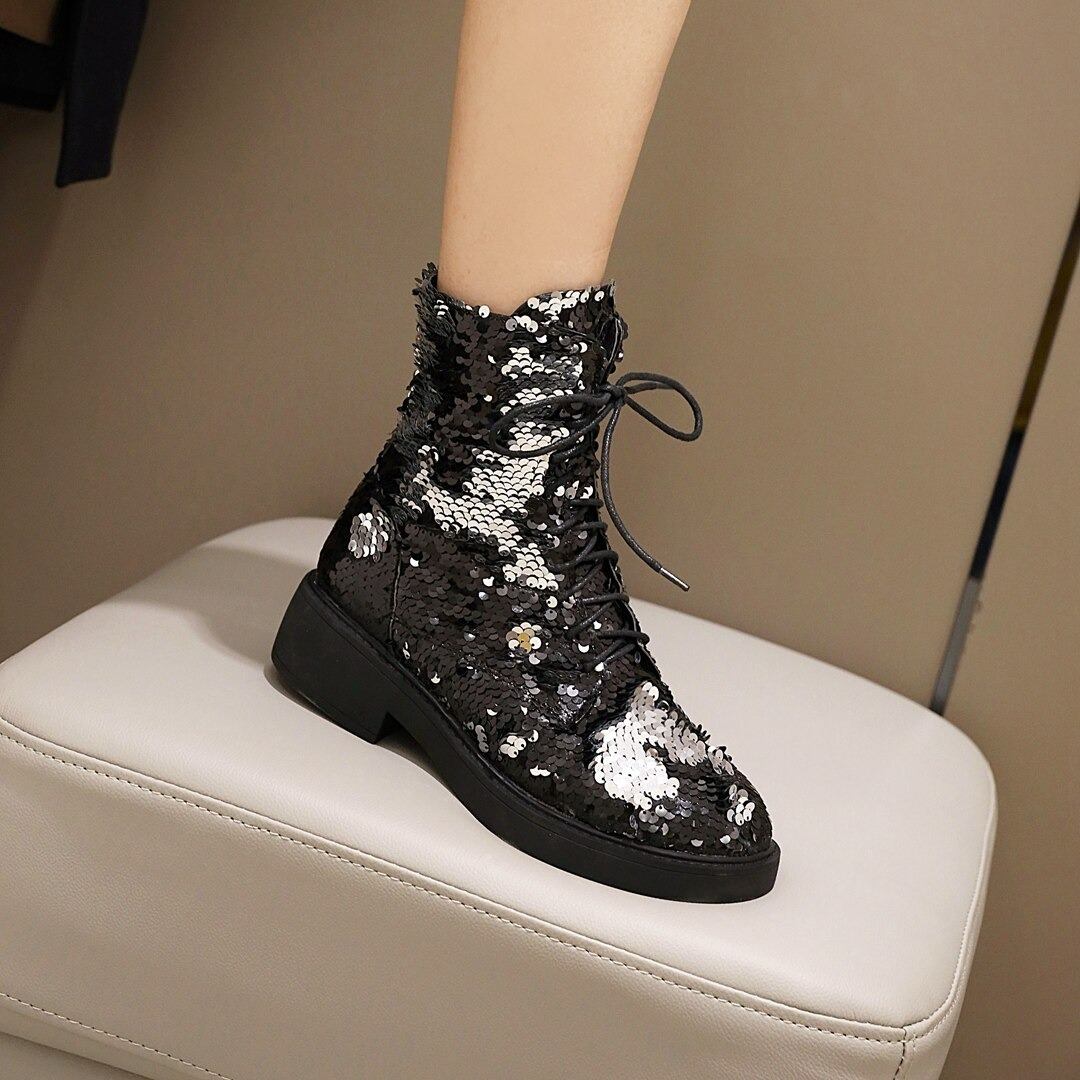 Stylish women's black sequined PU leather ankle boots with laces, perfect for autumn and winter fashion.