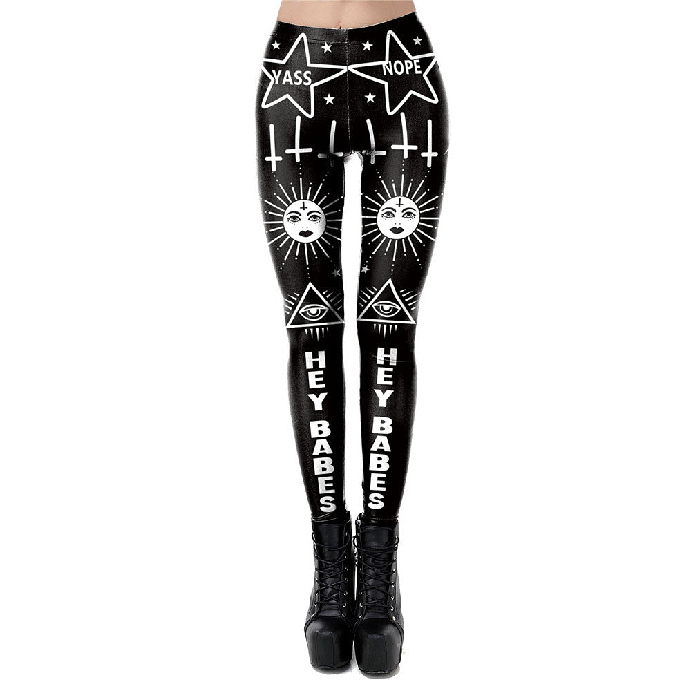 Black and white gothic leggings featuring fun symbols and phrases, perfect for a witchy look or Halloween outfit.
