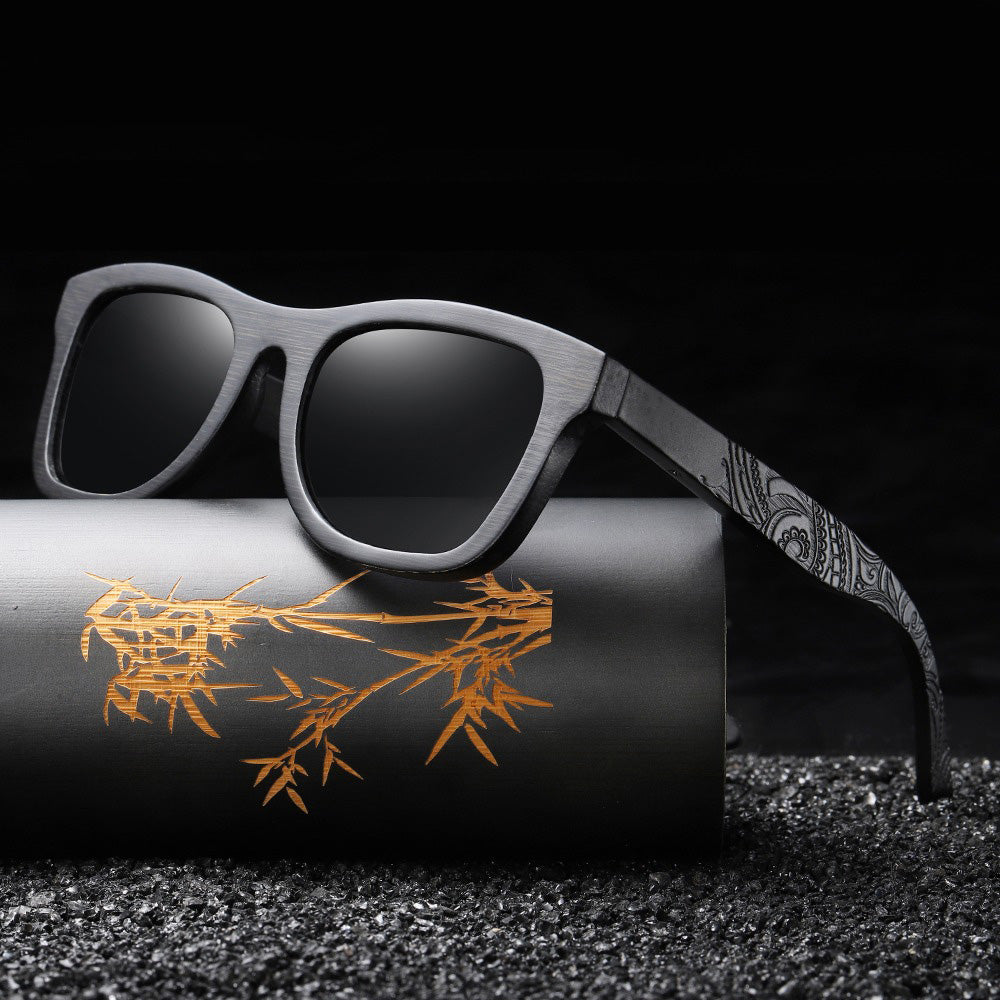 Bamboo unisex polarized sunglasses on a sleek display, showcasing stylish wooden frame and anti-reflective lenses.