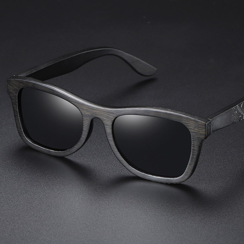 Bamboo unisex polarized sunglasses with wooden frame and sleek design, perfect for casual fashion and driving.