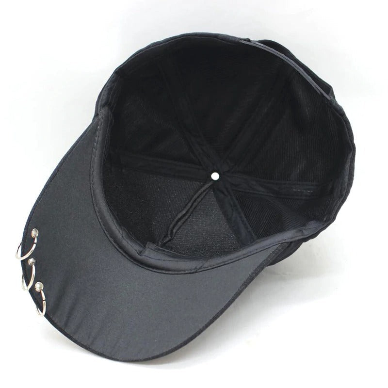 Inside view of unisex black baseball cap with rings, perfect for rave outfits and alternative clothing.