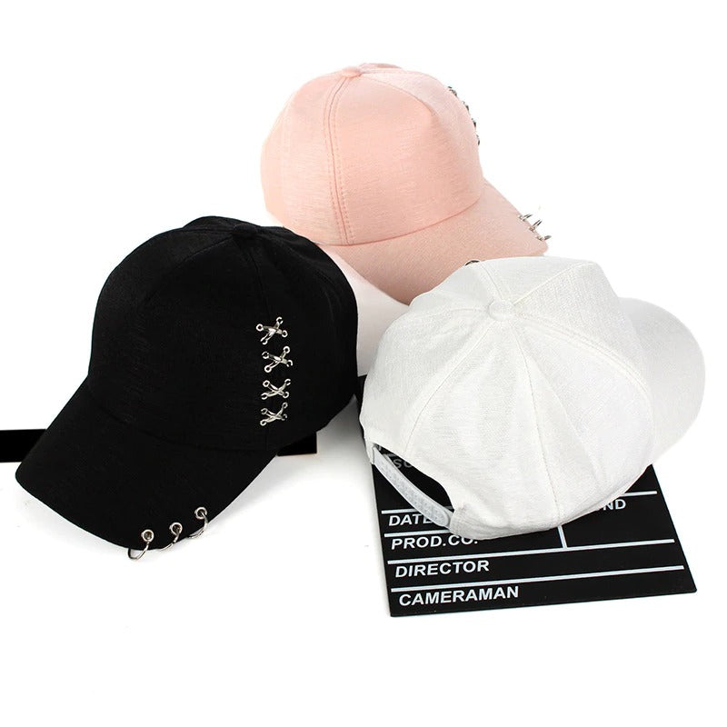 Unisex rave baseball caps in black, pink, and white, featuring unique ring designs for a stylish accessory.