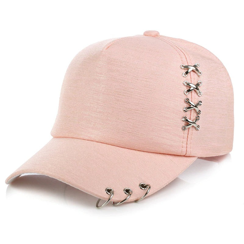 Unisex pink baseball cap with rings, perfect for rave outfits and alternative clothing styles.