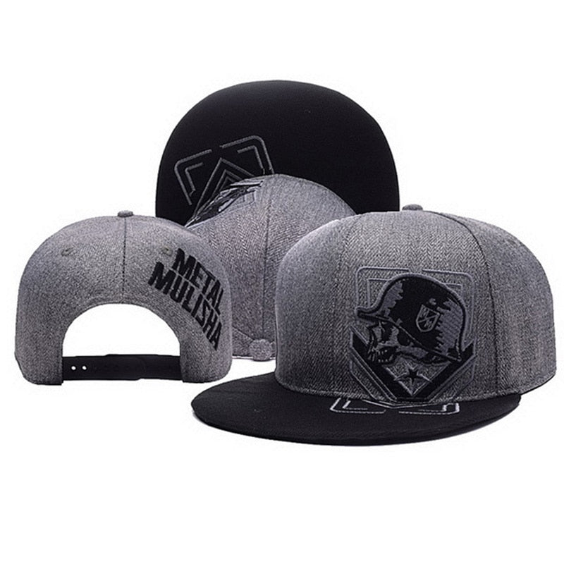 Baseball cap with skull embroidery, flat brim, snapback design for alternative fashion and outdoor style.
